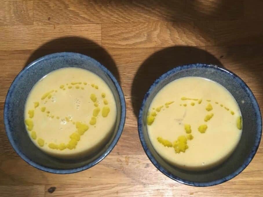 A drizzle of olive oil on Italian chickpea soup